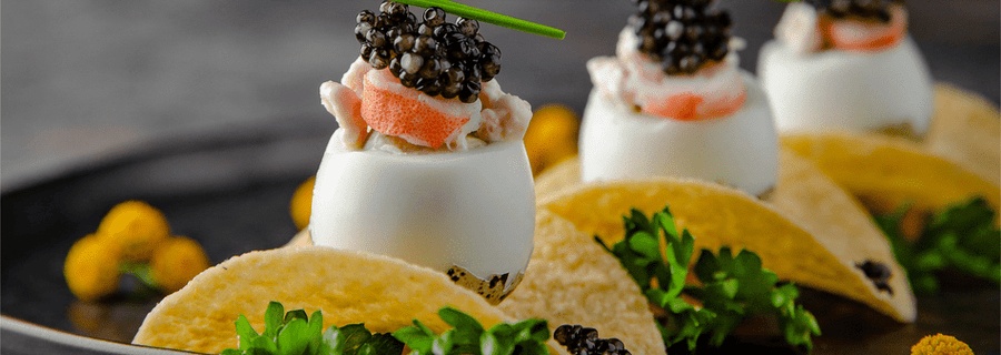 How can caviar be presented
